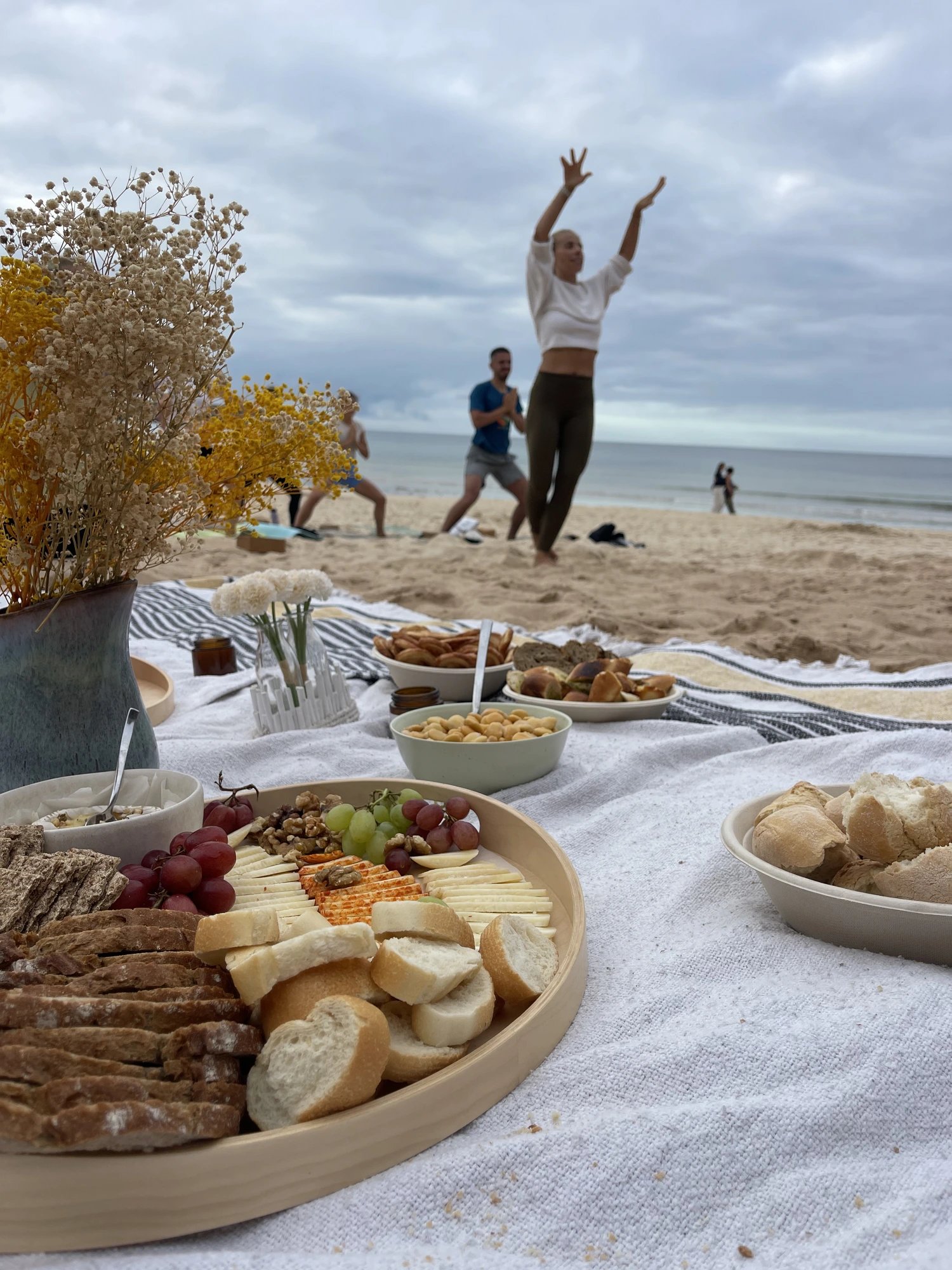 Wine & Tapas with Yoga at the Beach in Baleal — yoga flow behind the picnic