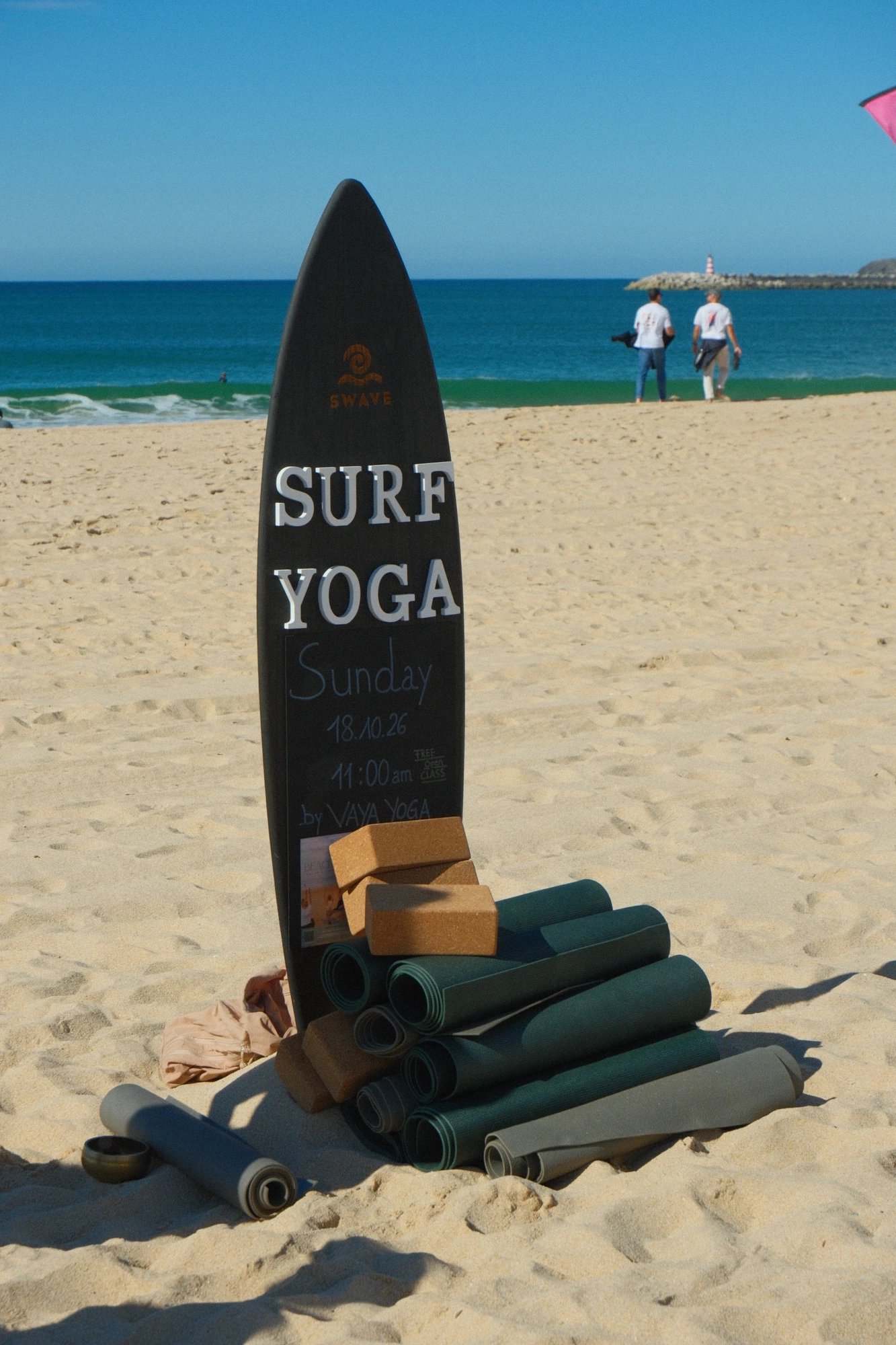 Surf Yoga board with mats on the beach at Supertubos